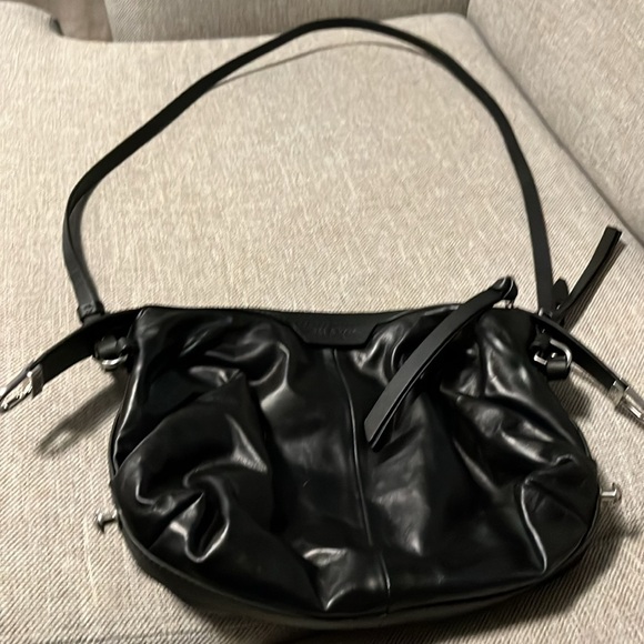 NWOT 

Rag & Bone black leather crossbody. Not worn. 10 by 7. Strap 19-22. - Picture 1 of 9